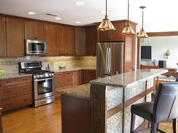 Interior of a kitchen with raised counter top